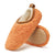 Warm apricot orange with chestnut trim